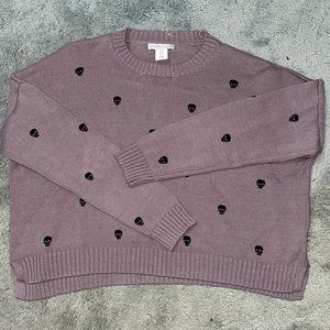 Sincerely Jules purple cropped sweater with black skull print